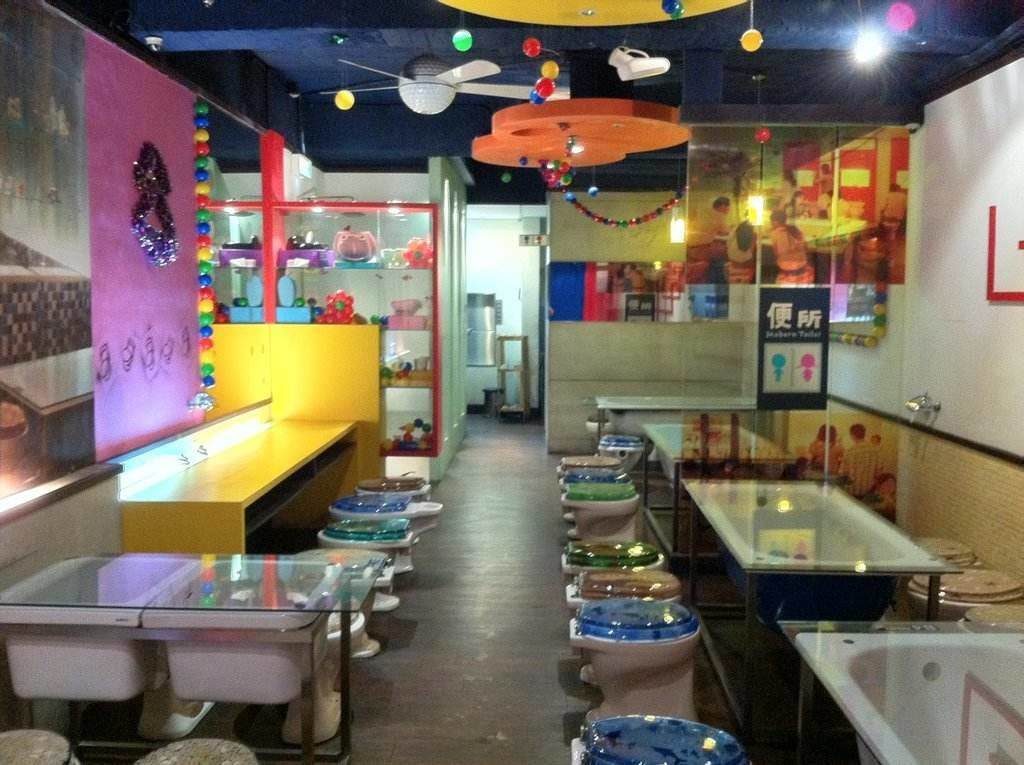 Modern Toilet Restaurant - 便所歡樂主題餐廳 in Taipei Ximending area.  Sitting on Toilets!