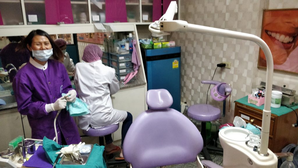 The V-Smile dental clinic in Chiang Mai.  It was about $20 USD for a cleaning and service with a smile.  And some free toothpaste!